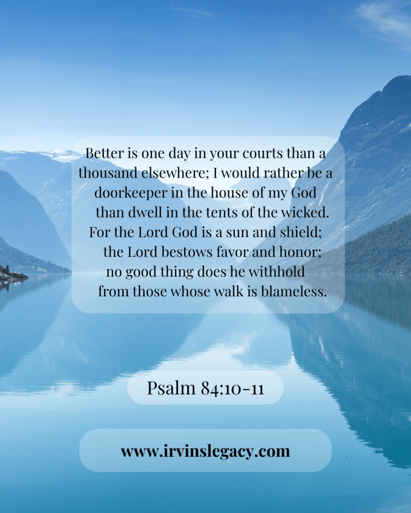 A serene landscape featuring a mountain reflected in calm water, with a biblical verse from Psalm 84:10-11 overlaid in elegant typography.